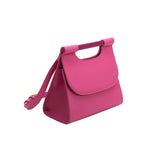 A small fuchsia square vegan leather crossbody bag with a wooden handle.